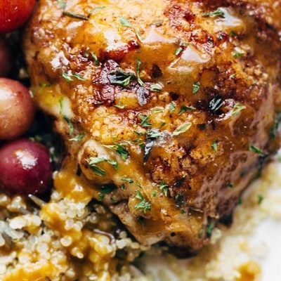 Skillet Chicken with Grapes and Caramelized Onions on a plate.
