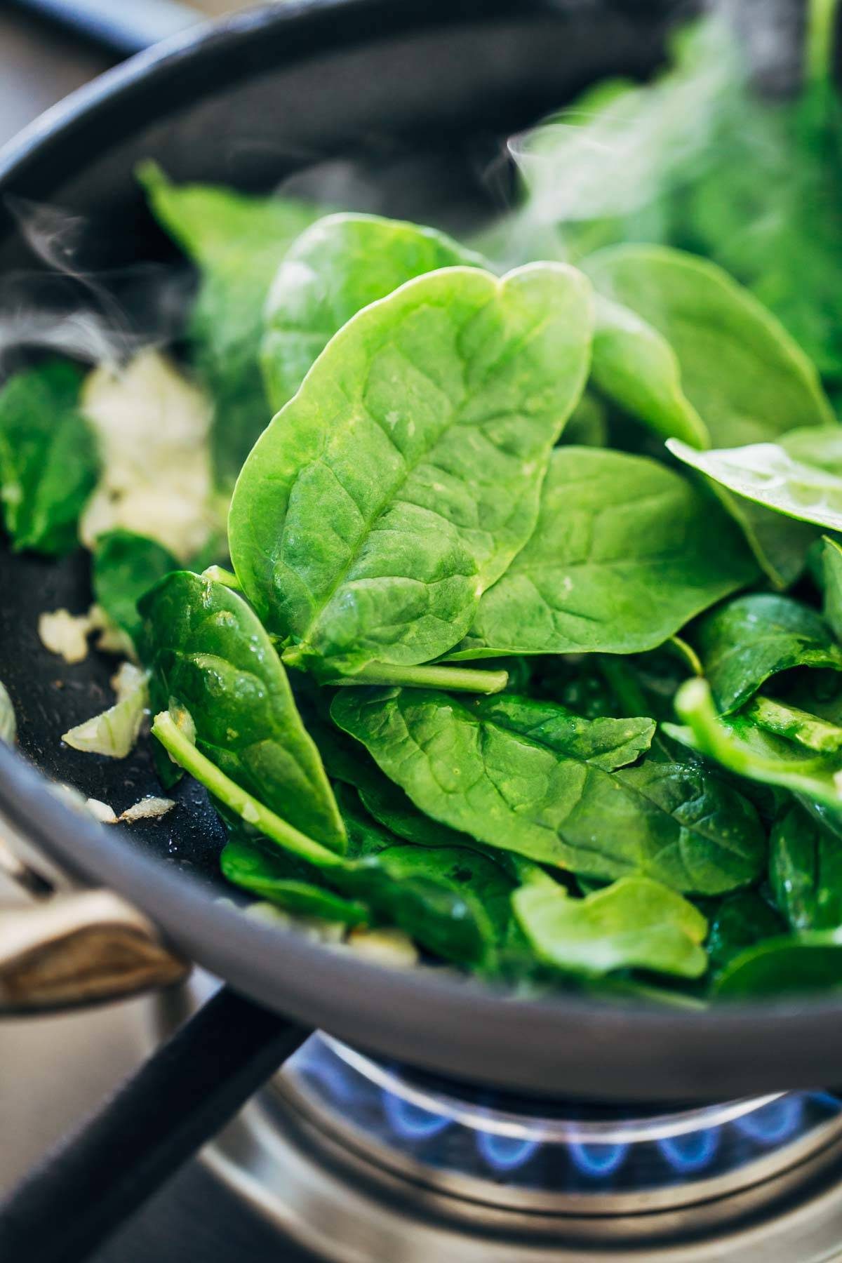 Healthy Sweet Potato Skins - a vegetarian recipe featuring sweet potatoes, spinach, and chickpeas! a MUST TRY for sweet potato lovers. | pinchofyum.com
